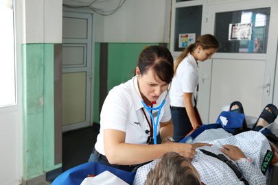Flight physician taking care of patient at the hospital