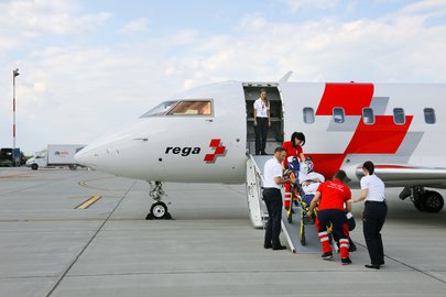 Loading patient into the ambulance jet
